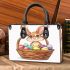 Happy easter bunny with a basket full of colored eggs small handbag