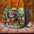 Happy smiling red eyed tree frog sitting on a branch saddle bag