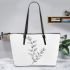 Minimalist Floral Delights Tranquil Elegance Leather Tote Bag