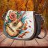 Music notes and guitar and roses and beta fish 3 Saddle Bag
