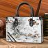 Musical notes and cherry blossoms and clownfish Small handbag