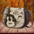 Musical notes and guitar and lily 3 Saddle Bag