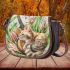 Musical notes and guitar and tulips and green leaf and cat Saddle Bag