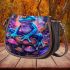 Neon blue frog sitting on top of colorful mushrooms in the forest saddle bag