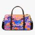Orange butterfly surrounded by colorful spring flowers 3d travel bag