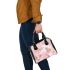 Pink and gold butterflies pattern shoulder handbag