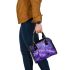 Purple crocuses with purple butterflies shoulder handbag