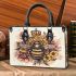 Queen bee sitting on top of honeycomb small handbag