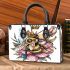 Queen bee with a crown sitting on flower small handbag