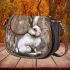 rabbit with dream catcher Saddle Bag