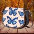 Seamless pattern with a digital illustration of blue butterflies saddle bag