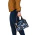 Seamless pattern with digital illustrations of blue butterflies shoulder handbag