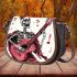 skeleton king play guitar and music notes Saddle Bag