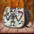 skeleton king play guitar trumpet dogs and music notes Saddle Bag