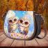 Two cute owls sitting on flowers with colorful butterflies saddle bag