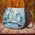 Two cute owls with feathers in shades of blue saddle bag