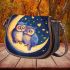 Two owls in love sitting on the crescent moon saddle bag