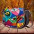 Vibrant and colorful painting of fish saddle bag
