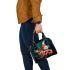 Vibrant butterfly garden shoulder handbag