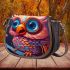 Vibrant owl perched saddle bag