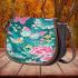 Vibrant pattern of pink and turquoise butterflies saddle bag