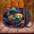 Vibrant teal frog with large eyes sits on top of colorful flowers saddle bag