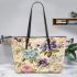 Vintage floral table arrangement leather tote bag