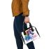 Watercolor horse in rainbow colors shoulder handbag