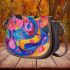 Watercolor painting with colorful patterns and shapes saddle bag