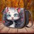 Whimsical rainbow cat on blue background saddle bag