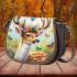 White tailed deer with large antlers and flowers on its head saddle bag