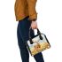 Whitetailed buck standing in a meadow with daisies shoulder handbag