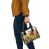 Whitetailed buck standing in meadow with daisies shoulder handbag