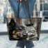 A Dog and Cat Love Story Leather Tote Bag