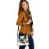 Abstract with the shape of a butterfly shoulder handbag