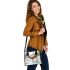 Adorable fawn standing in the snow shoulder handbag