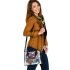 An intricate colorful painting shoulder handbag