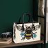 Bee with a blue flower on its back small handbag