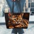 Bengal Cat as a Symbol of Strength and Grace 1 Leather Tote Bag