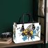 Bumblebee holding a blue forgetmenot flower small handbag