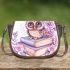 Cartoon owl with big eyes sitting on books surrounded by pink roses saddle bag