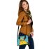 Circles and triangles in a blue sky shoulder handbag