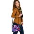 Colorful butterfly with flowers and leaves on purple shoulder handbag