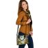 Colorful frogs hanging from tree branches in the jungle shoulder handbag