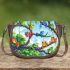 Colorful frogs hanging from tree branches in the jungle saddle bag