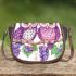 Cute and adorable two purple and pink owls sitting on the branch saddle bag