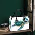 Cute baby turtle in the ocean small handbag