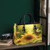 Cute bee sits on the petals of sunflowers small handbag