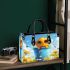 Cute cartoon baby bee sitting in a blue bucket small handbag