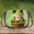 Cute cartoon frog sitting on a tree stump with big eyes saddle bag